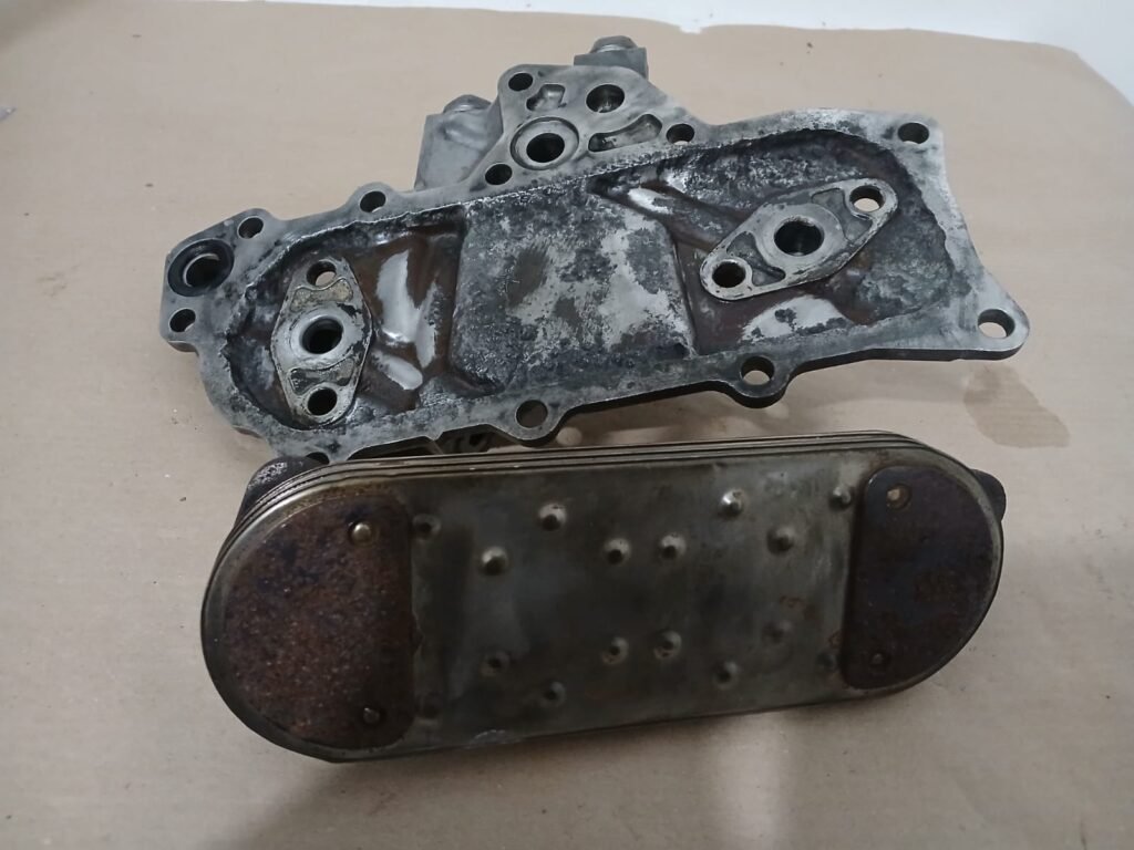 Conjunto Refrigerador de Óleo (Trocador de Calor) Nissan Frontier D21 1994 – Original Usado